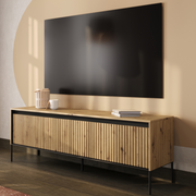 TV-Schrank TREND TR-05 in Artisan Eiche mit schwarzen Akzenten im modernen Wohnzimmer