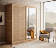DELIA Kleiderschrank – Moderner Lamellen-Schrank, Schiebetürenschrank mit Spiegel & Stauraum  180 cm - Holz