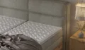 Boxspringbett mit elektrischer Verstellung und 7-Zonen-Matratze